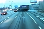 Improper Highway Maneuver Causes Truck Crash in Russia