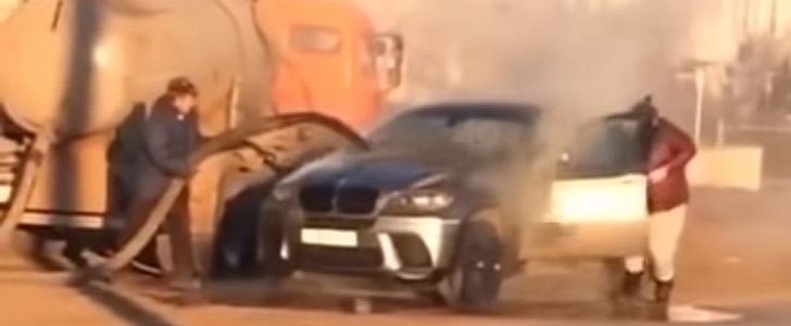 Driver of sewage truck uses human waste to put out fire on BMW X6