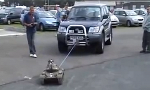 In Russia, Toy Tank Pulls Your Car!