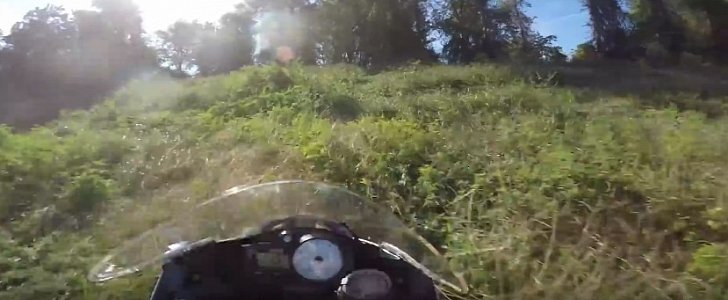 Rider goes off into trees