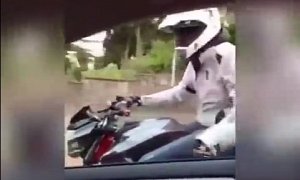 Instant Karma - Road-Raging Biker Crashes While Picking On Bad Driver