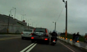 Irresponsible Honda CR-V Driver Nearly Knocks Over Father and Son On Scooter