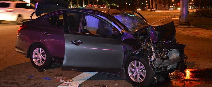 Cops failed to find body of injured passenger in this wrecked Nissan Versa