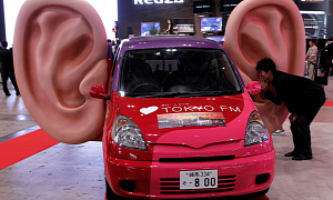 Japanese Driver Fined for Picking His Ears Sues and Wins!