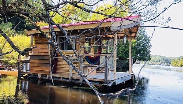 The River Zen is an off-grid floating cabin designed as a Japanese retreat