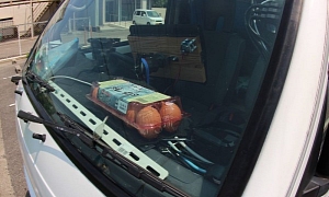 Japanese Man Makes Poached Eggs on Hot Dashboard in Summer