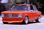 Jay Leno Experiences BMW's Evolution of Sheer Driving Pleasure in a 1972 BMW 2002 Restomod