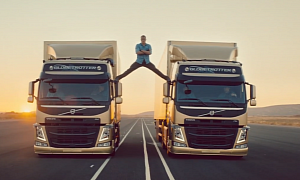 Jean-Claude Van Damme Does Epic Splits Between Reversing Trucks