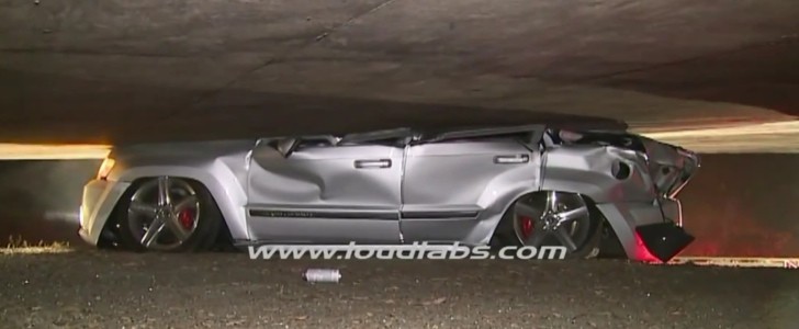 Jeep Grand Cherokee SRT8 Gets Crushed Under a Freeway Ramp
