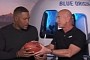 Jeff Bezos Gives Michael Strahan a Football for His Upcoming Space Trip