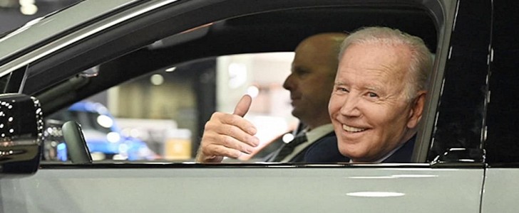 Joe Biden offers reporters a ride back to Washington in a 2023 Cadillac Lyriq EV