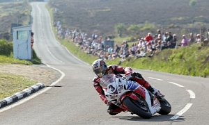 John McGuinness and Bruce Anstey Riding Two Electric Mugen Bikes in the 2014 TT Zero