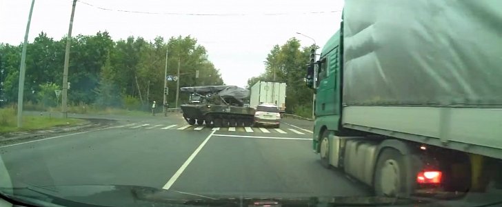 Russian military vehicle drifting into Skoda Yeti