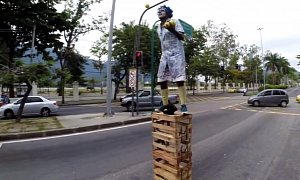 Juggler Performs on a Box at Traffic Lights in Brazil