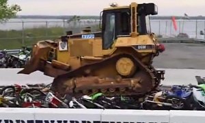Just a Bulldozer Crushing Dozens of Bikes and Quads, Nothing to See Here