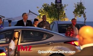 Kanye West Looks Embarrassed As He Steps in the Passenger’s Seat of a Hyundai Elantra