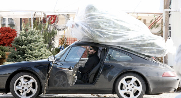Keanu is strapping the tree to his 911