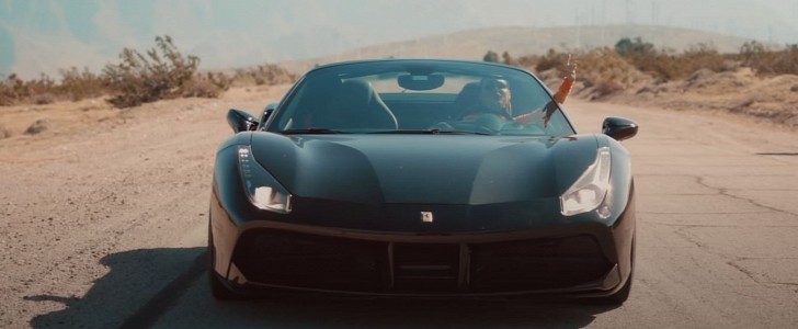 Kehlani at the wheel of a black Ferrari 488, which she reportedly damaged