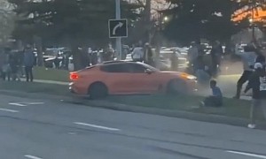 Kia Stinger Turns Into a Mustang, Goes Over the Curb and Almost Plows Into the Crowd