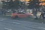 Kia Stinger Turns Into a Mustang, Goes Over the Curb and Almost Plows Into the Crowd
