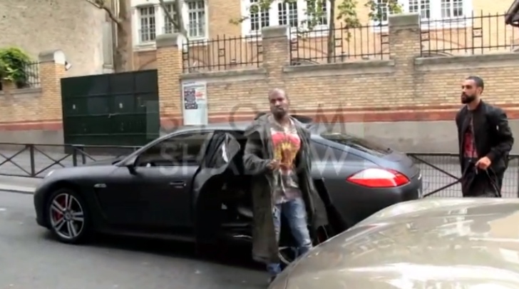 Kanye and the blacked out Porsche