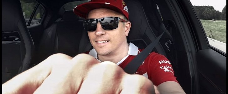 Kimi Raikkonen smiles when driving the Alfa Romeo Giulia Quadrifoglio