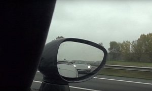 Koenigsegg Agera R's Rear Wing Shakes at over 200 MPH While Porsche 918 Chases