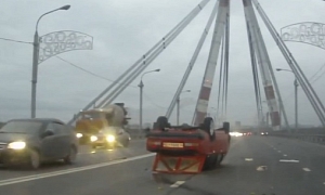 Lada Ends Up Upside Down on Russian Bridge