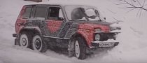 Lada Niva 6x6 Pulling Cars Out Of Snow in Russia Looks Awesome