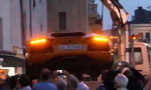 Lamborghini Aventador Lifted and Towed Away