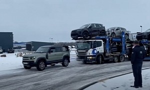Land Rover Defender Tows Scania Truck With 7 Other Land Rovers, Is an “Icon”