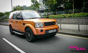 Land Rover Discovery Is an Awesome Orange Chameleon <span>· Video</span>