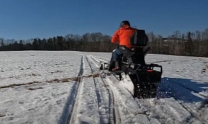 Legit Vermont Farmer Test Drives Word's First Electric Snowmobile, Here's What He Thinks