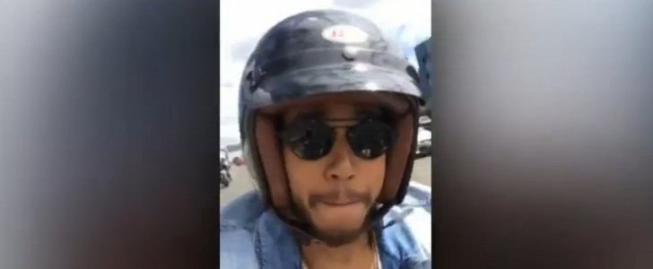 Lewis Hamilton videos himself while riding a motorcycle