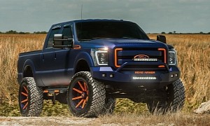 Lifted Blue and Orange-Wrapped Ford F-250 Super Duty Rides on Matching Forgiatos