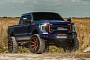 Lifted Blue and Orange-Wrapped Ford F-250 Super Duty Rides on Matching Forgiatos