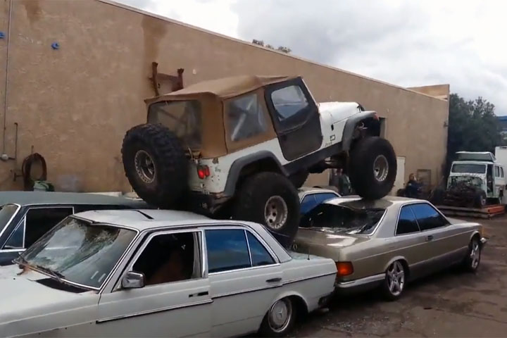 car-crushing Jeep Wrangler 