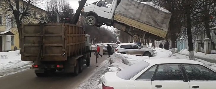 Light truck gets picked up by monstrous device