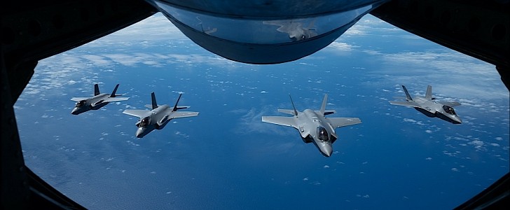 Formation of four F-35 Lightning IIs over the Pacific