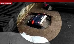 “Little” Sinkhole Makes Short Work of Entire Car Within Seconds After Heavy Rain