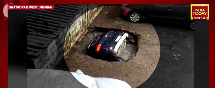 Mumbai, India, Ghatkopar parking lot sinkhole swallows a Hyundai Venue in seconds