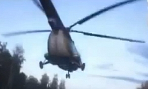 Low-Flying Russian Military Helicopter Overtakes Cars