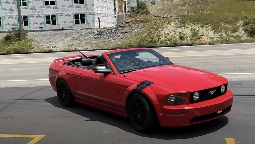 2006 Ford Mustang almost crashes as it leaves the shop