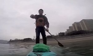 Man Paddle Boards to Work, Cuts 1 Hour Commute to Just 6 Minutes