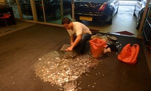 Man Pays $19,000 in Coins to Dealership after Aston Martin Conflict