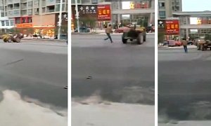 Man Qualifies for "Dumbest Person Alive" after Dismounting a Running Excavator