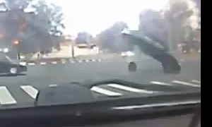 Manhole Cover Almost Flips Car