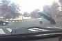 Manhole Cover Almost Flips Car