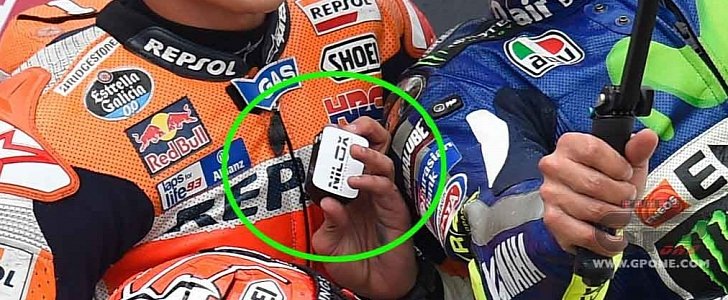 Marquez holding a Nilox camera at Sachsenring