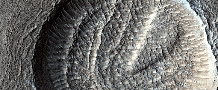 Imapct crater with wind-blown ripples